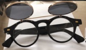 Sunglasses with clamshell Frame